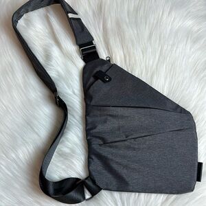NWOT DXYZ Travel Sling Bag